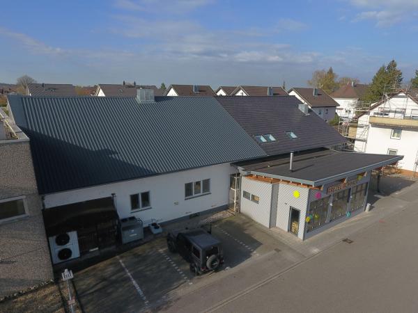 Brezel Böhmer Kuppenheim Dachsanierung mit Verkaufsraum/Café-Anbau 