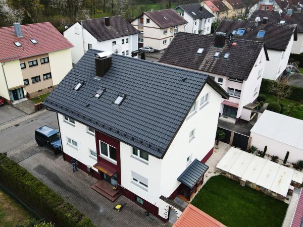 Dachsanierung mit Betondachsteinen