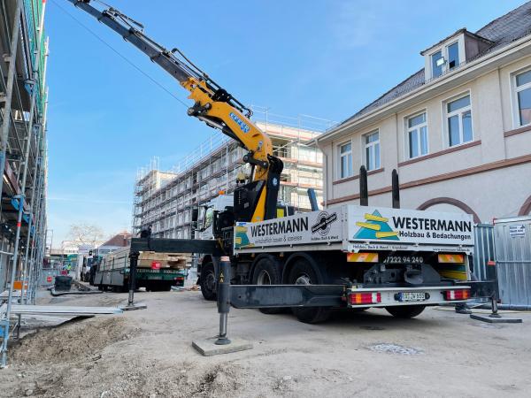 Effer 655 / Unimog 2450 mit Tieflader und Bauholz